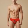 Model wearing Foxyz red printed underware with fountain of love print on it